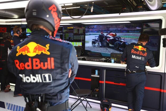 F1 Grand Prix of Italy Red Bull Racing team watches the crash on a screen, F1 Grand Prix of Italy at Autodromo Nazionale Monza on September 12, 2021 in Monza, Italy. (Photo by Bryn Lennon Getty Images FIA Pool via HOCH ZWEI) Monza Autodromo di Monza Italy Poolfoto HOCH ZWEI Pool Getty Images ,EDITORIAL USE ONLY