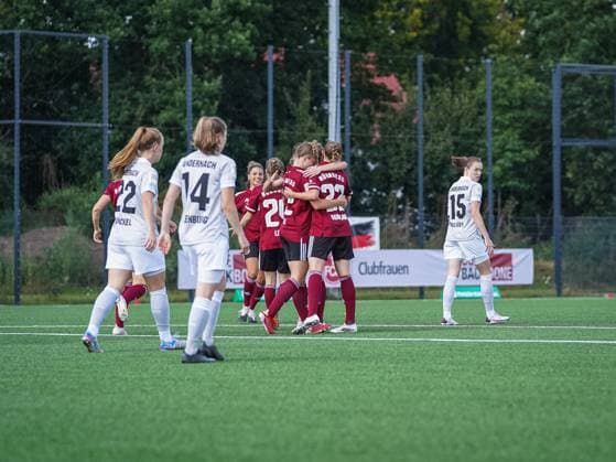 Nuernberg, Germany, September 12 Players of Nuernberg celebrate their goal during the 2. Womens Bundesliga match between 1. FC Nuernberg and SG 99 Andernach at Sports Park Valznerweiher in Nuernberg, Germany. 2. Womens Bundesliga - 1. FC N?rnberg v SG 99 Andernach 