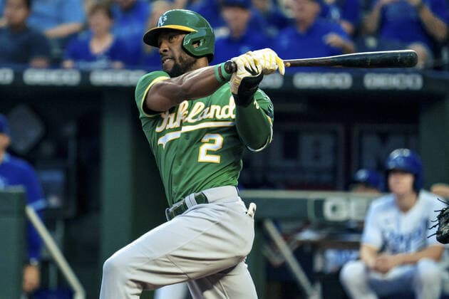 Oakland Athletics center fielder Starling Marte (2) takes a large swing at a Kansas City Royals pitch in the first inning at Kauffman Stadium in Kansas City, Missouri on Tuesday, September 14, 2021.  KCP20210914103 KYLExRIVAS