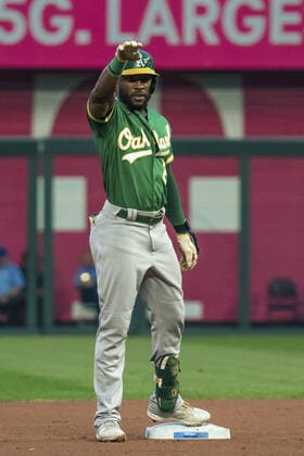 Oakland Athletics center fielder Starling Marte (2) celebrates after hitting a double against the Kansas City Royals at Kauffman Stadium in Kansas City, Missouri on Tuesday, September 14, 2021.  KCP20210914104 KYLExRIVAS
