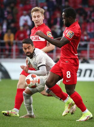 MOSCOW, RUSSIA â€“ SEPTEMBER 15, 2021: FC Legia Warsaw s Kacper Skibicki (L) and FC Spartak Moscow s Victor Moses (L-R front) in action in their 2021 22 UEFA Europa League Group C football match, at Otkrytie Arena Stadium. Sergei Fadeichev TASS  TS110842