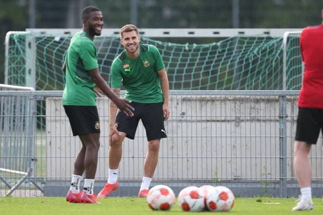 SOCCER - UEFA EL, Rapid vs Genk VIENNA,AUSTRIA,15.SEP.21 - SOCCER - UEFA Europa League, group stage, SK Rapid Wien vs KRC Genk, preview, training Rapid. Image shows Kelvin Arase and Thorsten Schick (Rapid).  GEPAxpictures xDavidxBitzan