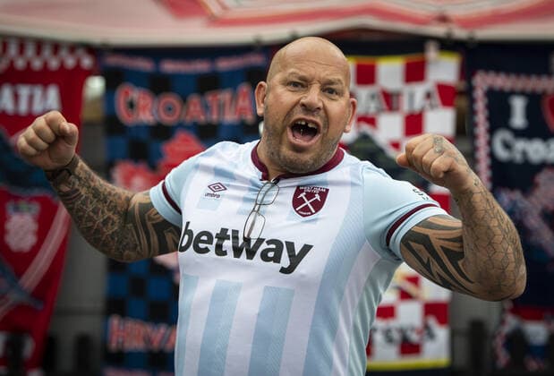 Mandatory Credit: Photo by Simon Dael Shutterstock (12446971b) West Ham United fans Dinamo Zagreb v West Ham United, UEFA Europa League, Group H, Football, Stadion Maksimir, Zagreb, Croatia - 16 Sep 2021 EDITORIAL USE ONLY No use with unauthorised audio, video, data, fixture lists, club league logos or live services. Online in-match use limited to 120 images, no video emulation. No use in betting, games or single club league player publications. Dinamo Zagreb v West Ham United, UEFA Europa League, Group H, Football, Stadion Maksimir, Zagreb, Croatia - 16 Sep 2021 EDITORIAL USE ONLY No use with unauthorised audio, video, data, fixture lists, club league logos or live services. Online in-match use limited to 120 images, no video emulation. No use in betting, games or single club league player publications. Copyright: xSimonxDael Shutterstockx 12446971b