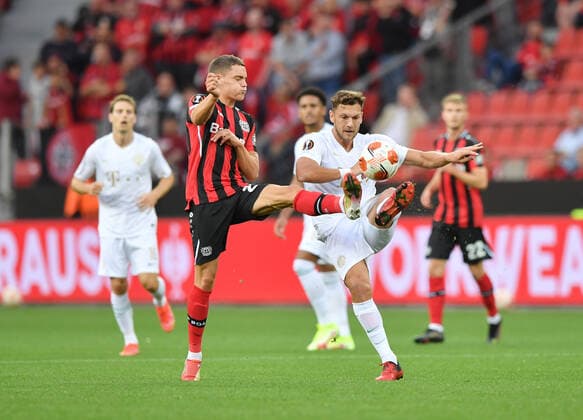 Florian Wirtz Bayer 04 Leverkusen , left , vs Balint Vecsei Ferencvaros Budapest 16 09 2021, Football GER, UEFA Europa League 2021 22, Group Stage, Matchday 1, Bayer 04 Leverkusen Ferencvaros Budapest, Photo Maik Hölter TEAM2sportphoto Leverkusen North Rhine Westphalia Germany. Team2