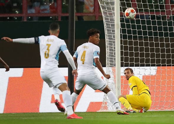 MOSCOW, RUSSIA â€“ SEPTEMBER 16, 2021: FC Lokomotiv Moscow s goalkeeper Guilherme Marinato defends against FC Olympique de Marseille s Boubacar Kamara, Alvaro Gonzalez (R-L) in their 2021 22 UEFA Europa League Group E football match, at RZD Arena Stadium. Sergei Savostyanov TASS  TS110AA0