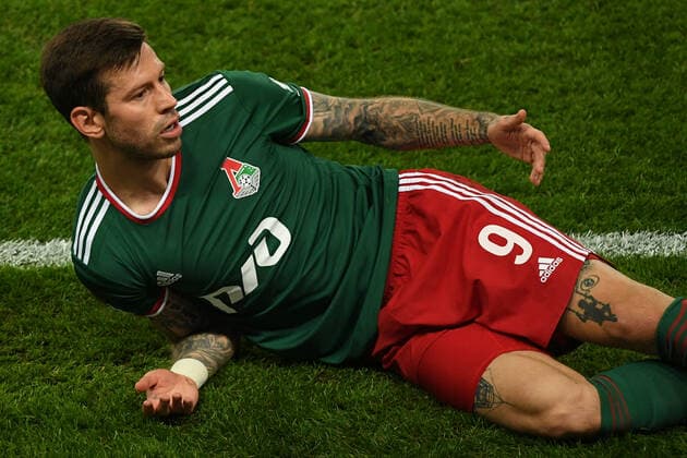 6652366 16.09.2021 Lokomotiv s Fyodor Smolov rects during the Europa League soccer match between Lokomotiv Moscow and Olympique de Marseille, in Moscow, Russia. Ramil Sitdikov Sputnik Russia Soccer Europa League Lokomotiv - Marseille  886e271b5e349039