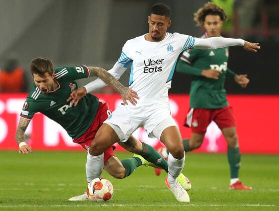 MOSCOW, RUSSIA â€“ SEPTEMBER 16, 2021: FC Lokomotiv Moscow s Fyodor Smolov (L) and FC Olympique de Marseille s Amine Harit in action in their 2021 22 UEFA Europa League Group E football match, at RZD Arena Stadium. Sergei Savostyanov TASS  TS110ABC