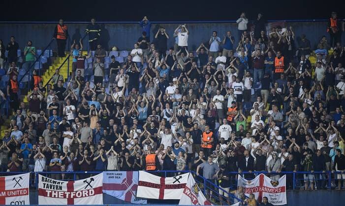 Mandatory Credit: Photo by Simon Dael Shutterstock (12446971du) West Ham United fans Dinamo Zagreb v West Ham United, UEFA Europa League, Group H, Football, Stadion Maksimir, Zagreb, Croatia - 16 Sep 2021 EDITORIAL USE ONLY No use with unauthorised audio, video, data, fixture lists, club league logos or live services. Online in-match use limited to 120 images, no video emulation. No use in betting, games or single club league player publications. Dinamo Zagreb v West Ham United, UEFA Europa League, Group H, Football, Stadion Maksimir, Zagreb, Croatia - 16 Sep 2021 EDITORIAL USE ONLY No use with unauthorised audio, video, data, fixture lists, club league logos or live services. Online in-match use limited to 120 images, no video emulation. No use in betting, games or single club league player publications. Copyright: xSimonxDael Shutterstockx 12446971du