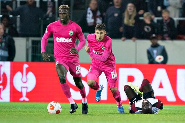 Ludogorets Stephane Badji passes FC Midtjyllands Awer Mabil in Europa League group F match between FC Midtjylland and PFC Ludogorets at Mch Arena in Herning, Thursday 16 September 2021, Herning Jylland Denmark  Copyright: HenningxBagger HenningxBaggerx COP102 spdk20210916-205415-L