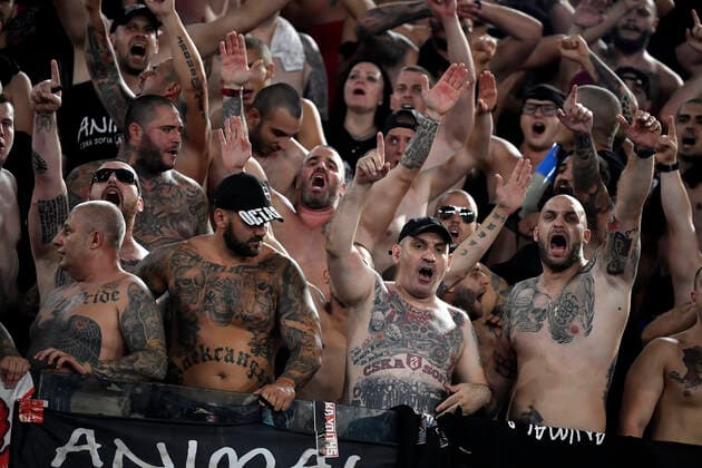Sport Bilder des Tages Fußball, EL, AS Rom - CSKA Sofia Ultras supporters of CSKA Sofia cheer on during the Conference league group C football match between AS Roma and PFC CSKA Sofia at Olimpico stadium in Rome (Italy), September 16th, 2021. One of the ultras has a swastika tattooed on his chest. Photo Antonietta Baldassarre Insidefoto antoniettaxbaldassarre