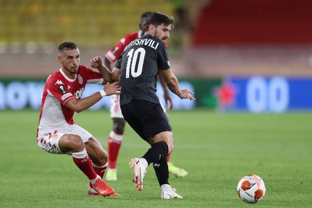 Fußball, EL, AS Monaco - SK Sturm Graz Monaco, Monaco, 16th September 2021. Otar Kiteishvili of SK Sturm Graz is challenged by Ruben Aguilar of AS Monaco during the UEFA Europa League match at Stade Louis II, Monaco. Picture credit should read: Jonathan Moscrop Sportimage EDITORIAL USE ONLY. No use with unauthorised audio, video, data, fixture lists, club league logos or live services. Online in-match use limited to 120 images, no video emulation. No use in betting, games or single club league player publications. SPI-1189-0027