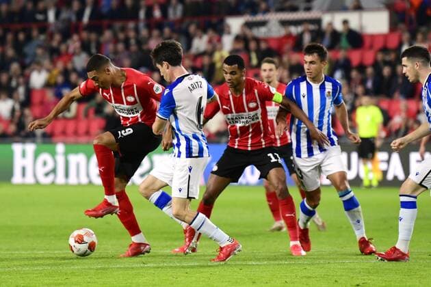 EINDHOVEN lr Carlos Vinicius of PSV Eindhoven, Aritz Elustondo of Real Sociedad, Cody Gakpo of PSV Eindhoven, Martin Zubimendi of Real Sociedad during the UEFA Europa League match between PSV Eindhoven and Real Sociedad at the Phillips stadium on September 16, 2021 in Eindhoven , The Netherlands ANP OLAF KRAAK UEFA Europa League 2021 2022 xVIxANPxSportx xxANPxIVx 437648238