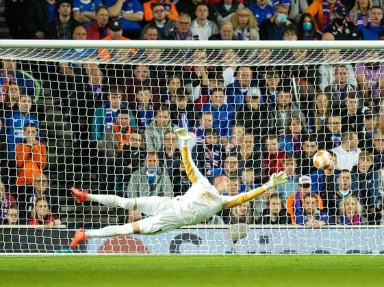 Mandatory Credit: Photo by Stuart Wallace Shutterstock (12447004t) Rangers goalkeeper Allan McGregor can t stop a shot from Karl Toko Ekambi of Olympique Lyon, who scores to give Lyon a 0-1 lead. Rangers v Olympique Lyonnais, UEFA Europa League, Group A, Football, Ibrox Stadium, Glasgow, UK - 16 Sep 2021 EDITORIAL USE ONLY No use with unauthorised audio, video, data, fixture lists, club league logos or live services. Online in-match use limited to 120 images, no video emulation. No use in betting, games or single club league player publications. Rangers v Olympique Lyonnais, UEFA Europa League, Group A, Football, Ibrox Stadium, Glasgow, UK - 16 Sep 2021 EDITORIAL USE ONLY No use with unauthorised audio, video, data, fixture lists, club league logos or live services. Online in-match use limited to 120 images, no video emulation. No use in betting, games or single club league player publications. Copyright: xStuartxWallace Shutterstockx 12447004t