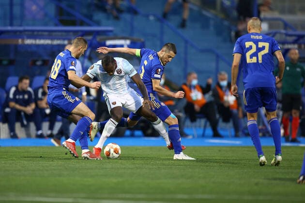 PXL_Dinamo Zagreb v West Ham United: Group H - UEFA Europa League ZAGREB, CROATIA - SEPTEMBER 16: Michail Antonio of West Ham United in action with Bartol Franjic and Arijan Ademi of Dinamo Zagreb during the UEFA Europa League group H match between Dinamo Zagreb and West Ham United at Maksimir Stadium on September 16, 2021 in Zagreb, Croatia. MatijaxHabljak PIXSELL
