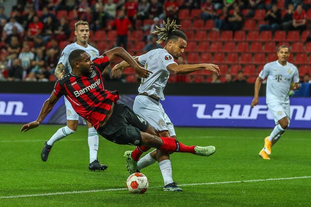 Jonathan Tah Bayer 04 Leverkusen, 04 in duel against Mmaee Samy Ferencvaros Budapest Ferencvarosi Torna Club, 03 , GER, Bayer 04 Leverkusen vs Ferencvaros Budapest Ferencvarosi Torna Club, UEFA Europa League Group G, Group Stage, Season 2021 2022, 16 09 2021, , DFB DFL regulations prohibit any use of photographs as image sequences and or quasi video , GER, Bayer 04 Leverkusen vs Ferencvaros Budapest Ferencvarosi Torna Club, UEFA Europa League Group G, Group stage, Match time 2021 2022, 16 09 2021 Leverkusen Copyright: xEibner-Pressefoto GabrielxBoiax EP_GBA