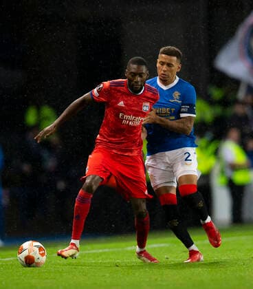 Football - 2021 2022 UEFA Europa League - Group A, Round One - Glasgow Rangers vs Lyon - Ibrox stadium - Thursday 16th September 2021 Karl Toko Ekambi of Olympique Lyonnais vies with James Tavernier of Rangers 