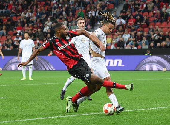 Jonathan Tah Bayer 04 Leverkusen , left , vs Samy Mmaee Ferencvaros Budapest 16 09 2021, Football GER, UEFA Europa League 2021 22, Group Stage, Matchday 1, Bayer 04 Leverkusen Ferencvaros Budapest 2 1, Photo by Maik Hölter TEAM2sportphoto Leverkusen North Rhine Westphalia Germany. Team2