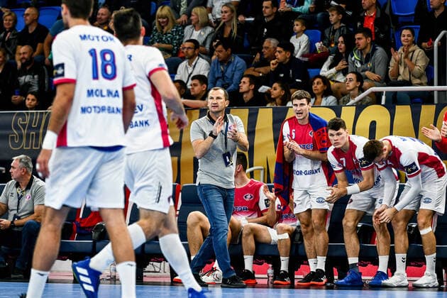 ZAPORIZHZHIA, UKRAINE - SEPTEMBER 16, 2021 - Head coach of HC Motor Gintaras Savukynas (C) is seen on the sideline during the 2021 2022 EHF Champions League Matchday 1 Group B game against FC Porto at the Yunist Palace of Sports, Zaporizhzhia, southeastern Ukraine. HC Motor 30-27 FC Porto in EHF CL Men match in Zaporizhzhia  Copyright: xDmytroxSmolyenkox