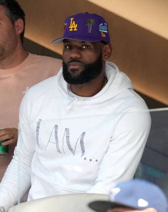 Los Angeles Laker LeBron James watches the Chargers-Cowboys game at SoFi Stadium on Sunday, September 19, 2021 in Inglewood, California. The Cowboys defeated the Chargers 20-17.  LAP20210919809 JONxSOOHOO