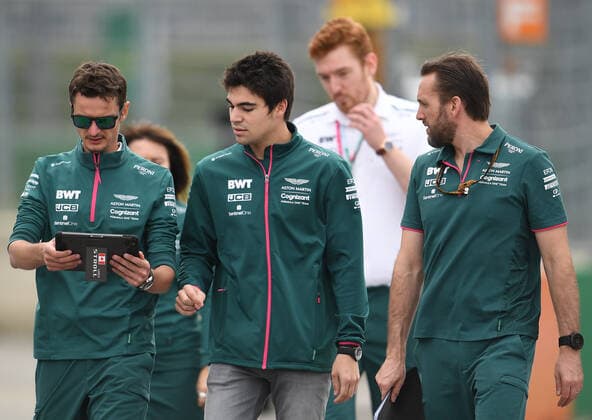 6657265 23.09.2021 Aston Martin s Canadian driver Lance Stroll walks during preparations for the 2021 Formula One Russian Grand Prix, at the Sochi Autodrom racing circuit, in Sochi, Russia. Formula One Russian Grand Prix will be held in Sochi from 24 to 26 September. Vladimir Astapkovich Sputnik Russia Motor Formula 1 Preparations  a109c6b065a3f01e