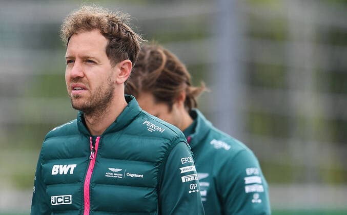 6657260 23.09.2021 Aston Martin s driver Sebastian Vettel walks during preparations for the 2021 Formula One Russian Grand Prix, at the Sochi Autodrom racing circuit, in Sochi, Russia. Formula One Russian Grand Prix will be held in Sochi from 24 to 26 September. Vladimir Astapkovich Sputnik Russia Motor Formula 1 Preparations  7fde99490346e0ed