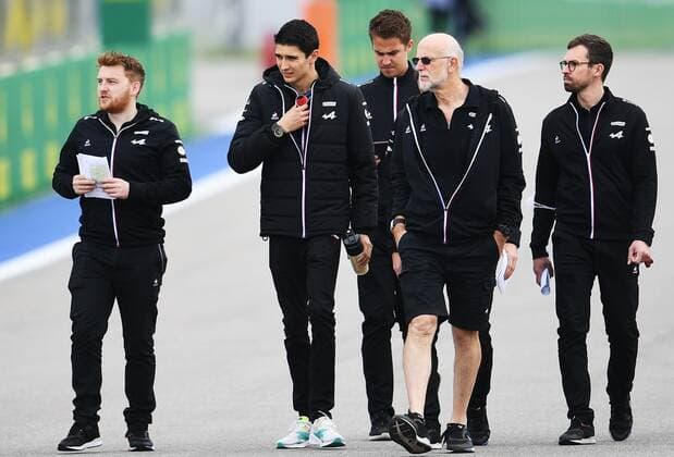 6657247 23.09.2021 Alpine F1 Team driver Esteban Ocon of France walks with team members during preparations for the 2021 Formula One Russian Grand Prix, at the Sochi Autodrom racing circuit, in Sochi, Russia. Formula One Russian Grand Prix will be held in Sochi from 24 to 26 September. Vladimir Astapkovich Sputnik Russia Motor Formula 1 Preparations  1d3621aaaa52541c