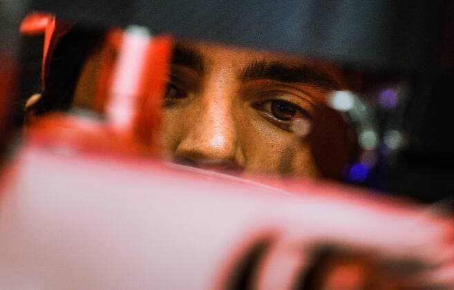 6657440 23.09.2021 Ferrari driver Carlos Sainz Jr from Spain is pictured during preparations for the 2021 Formula One Russian Grand Prix, at the Sochi Autodrom racing circuit, in Sochi, Russia. Formula One Russian Grand Prix will be held in Sochi from 24 to 26 September. Vladimir Astapkovich Sputnik Russia Motor Formula 1 Preparations  97d16032b9f84027