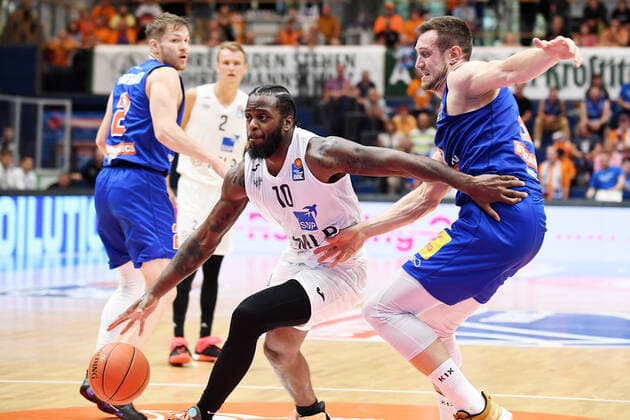 Basketball, 1 Bundesliga, Season 2021 2022, 1 Matchday, SYNTAINICS MBC Mitteldeutscher Basketball Club Weissenfels vs MLP Academics Heidelberg 25 09 2021 74 85 39 43 Duel for the ball between Kelvin Martin Forward Heidelberg, Rueckennummer 10 li and Johannes Richter Center MBC Weissenfels, Back number 8 right during the game Weißenfels vs Heidelberg 25 09 2021 In the background Leon Friederici Guard MBC Weissenfels, back number 2 and Niklas Wuerzner Guard Heidelberg, back number 2 Weißenfels Saxony Anhalt Germany Stadthalle Weißenfels