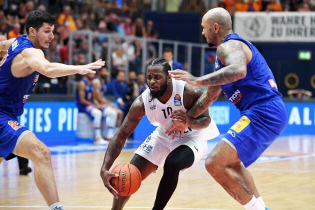 Basketball, 1 Bundesliga, 2021 2022 season, 1 matchday, SYNTAINICS MBC Mitteldeutscher Basketball Club Weissenfels vs MLP Academics Heidelberg 25 09 2021 74 85 39 43 Duel for the ball between Kelvin Martin Forward Heidelberg, back number 10 center , Sergio Kerusch Forward MBC Weissenfels, back number 7 right and Goran Huskic Center MBC Weissenfels, back number 23 left during the game Weißenfels vs Heidelberg 25 09 2021 Weißenfels Sachsen Anhalt Germany Stadthalle Weißenfels