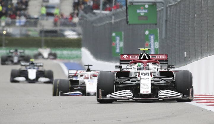 SOCHI, RUSSIA â€“ SEPTEMBER 26, 2021: Alfa Romeo Racing F1 Team driver Antonio Giovinazzi (front) of Italy competes in the 2021 Formula One Russian Grand Prix race, at the Sochi Autodrom racing circuit. Sergei Fadeichev TASS  TS112110
