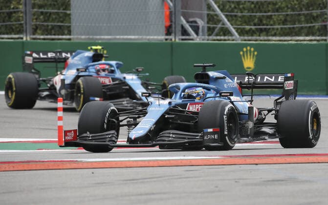 SOCHI, RUSSIA â€“ SEPTEMBER 26, 2021: Alpine F1 Team driver Fernando Alonso (front) of Spain competes in the 2021 Formula One Russian Grand Prix race, at the Sochi Autodrom racing circuit. Sergei Fadeichev TASS  TS112115
