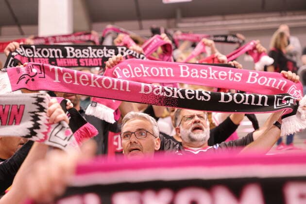 Fans with scarves at the Telekom Dome before the match Telekom Baskets Bonn vs ratiopharm Ulm easyCredit BBL 1 Bundesliga , season 2021 2022 , main round 2 matchday