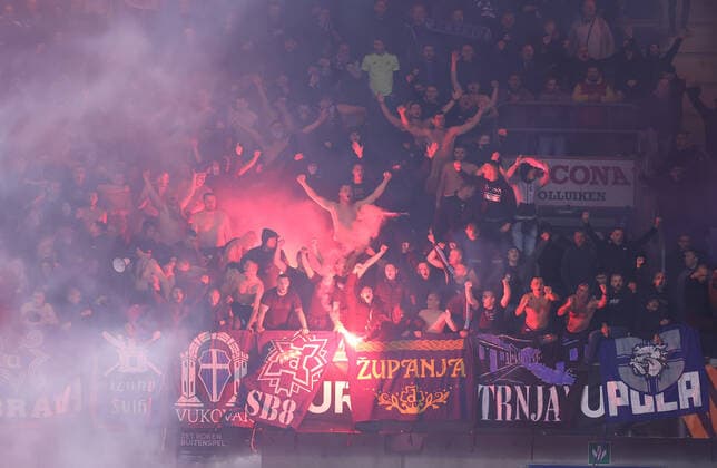 KRC Genk v Dinamo Zagreb: Group H - UEFA Europa League GENK, BELGIUM - SEPTEMBER 30: Supporters of Dinamo Zagreb use pyrotechnics during the UEFA Europa League group H match between KRC Genk and Dinamo Zagreb at Luminus Arena on September 30, 2021 in Genk, Belgium. MarkoxPrpic PIXSELL