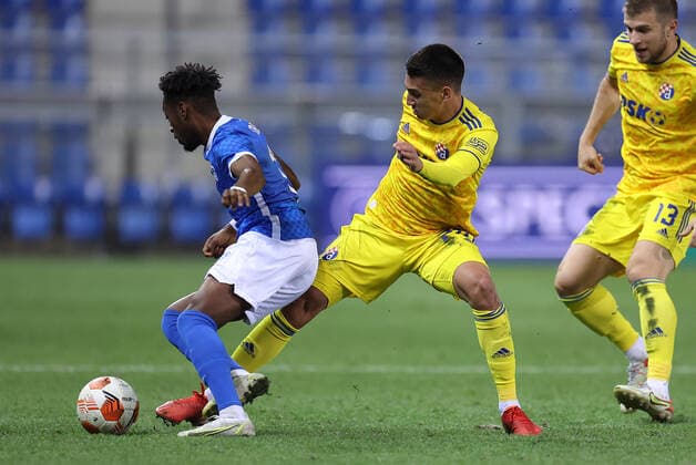 KRC Genk v Dinamo Zagreb: Group H - UEFA Europa League GENK, BELGIUM - SEPTEMBER 30:Mike Tresor of Genk and Luka Menalo of Dinamo Zagreb fights for the ball during the UEFA Europa League group H match between KRC Genk and Dinamo Zagreb at Luminus Arena on September 30, 2021 in Genk, Belgium. MarkoxPrpic PIXSELL