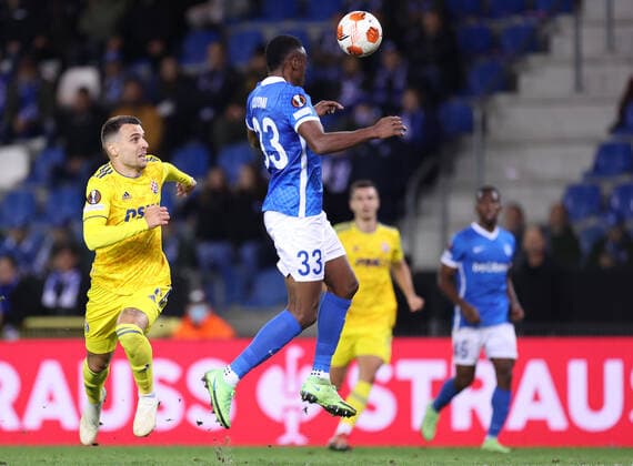 KRC Genk v Dinamo Zagreb: Group H - UEFA Europa League GENK, BELGIUM - SEPTEMBER 30: Jhon Lucumi of Genk and Komnen Andric of Dinamo Zagreb in action during the UEFA Europa League group H match between KRC Genk and Dinamo Zagreb at Luminus Arena on September 30, 2021 in Genk, Belgium. MarkoxPrpic PIXSELL