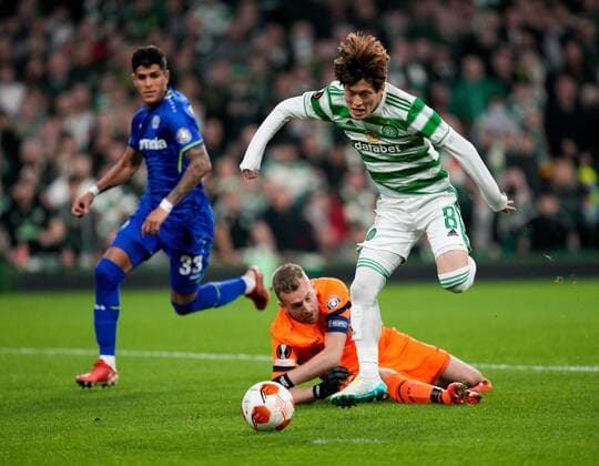 Mandatory Credit: Photo by Stuart Wallace Shutterstock (12516265ak) Kyogo Furuhashi of Celtic beats Bayer 04 Leverkusen goalkeeper Lukas Hradecky Celtic v Bayer Leverkusen, UEFA Europa League, Group G, Football, Celtic Park, Glasgow, UK - 30 Sep 2021 EDITORIAL USE ONLY No use with unauthorised audio, video, data, fixture lists, club league logos or live services. Online in-match use limited to 120 images, no video emulation. No use in betting, games or single club league player publications. Celtic v Bayer Leverkusen, UEFA Europa League, Group G, Football, Celtic Park, Glasgow, UK - 30 Sep 2021 EDITORIAL USE ONLY No use with unauthorised audio, video, data, fixture lists, club league logos or live services. Online in-match use limited to 120 images, no video emulation. No use in betting, games or single club league player publications.  Copyright: xStuartxWallace Shutterstockx 12516265ak