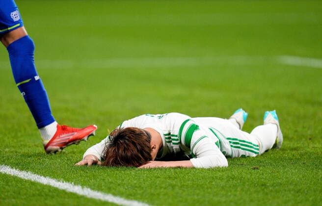 Mandatory Credit: Photo by Stuart Wallace Shutterstock (12516265aw) Kyogo Furuhashi of Celtic lays on the pitch after he was dispossessed as he tried to shoot into an empty goal after he beat Bayer 04 Leverkusen goalkeeper Lukas Hradecky Celtic v Bayer Leverkusen, UEFA Europa League, Group G, Football, Celtic Park, Glasgow, UK - 30 Sep 2021 EDITORIAL USE ONLY No use with unauthorised audio, video, data, fixture lists, club league logos or live services. Online in-match use limited to 120 images, no video emulation. No use in betting, games or single club league player publications. Celtic v Bayer Leverkusen, UEFA Europa League, Group G, Football, Celtic Park, Glasgow, UK - 30 Sep 2021 EDITORIAL USE ONLY No use with unauthorised audio, video, data, fixture lists, club league logos or live services. Online in-match use limited to 120 images, no video emulation. No use in betting, games or single club league player publications.  Copyright: xStuartxWallace Shutterstockx 12516265aw