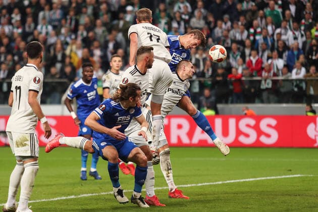 (211001) -- WARSAW, Oct. 1, 2021 -- Jannik Vastergaard (R, top) of Leicester wins a header with Artur Jedrzejczyk of Legia during the Europa League Group C football match between Legia Warsaw and Leicester City in Warsaw, Poland, Sept. 30, 2021. ) (SP)POLAND-WARSAW-FOOTBALL-EUROPA LEAGUE-LEGIA WARSAW-LEICESTER CITY AdamxStarszynski 
