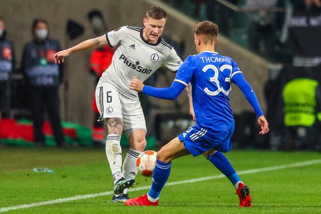 (211001) -- WARSAW, Oct. 1, 2021 -- Matias Johansson (L) of Legia competes during the Europa League Group C football match between Legia Warsaw and Leicester City in Warsaw, Poland, Sept. 30, 2021. ) (SP)POLAND-WARSAW-FOOTBALL-EUROPA LEAGUE-LEGIA WARSAW-LEICESTER CITY AdamxStarszynski 