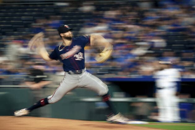 Minnesota Twins starting pitcher John Gant (33) pitches against the Kansas City Royals in the second inning at Kaufman Stadium in Kansas City, Missouri on Friday, October 1, 2021.  KCP20211001111 KYLExRIVAS