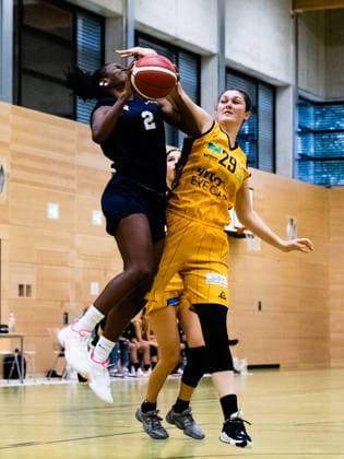 Duesseldorf, Germany, October 3r Maryam Mopelade Olantunji Adepoju ( 2 Capitol Bascats ) gets fouled by Kira Barra ( 29 Saarlouis ) during the 1. Toyota Damen Basketball Bundesliga game between the Capitol Bascats Duesseldorf and inexio Royals Saarlouis at Wekita Sportarena in Duesseldorf 1. Toyota Damen Basketball Bundesliga - Capitol Bascats Duesseld 