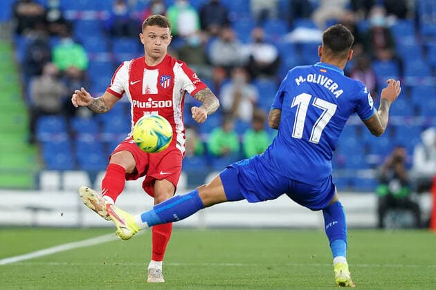Getafe CF s Mathias Olivera (r) and Atletico de Madrid s Kieran Trippier during La Liga match. September 21,2021. (2021092189)