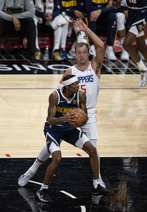 October 4, 2021, Los Angeles, California, USA: Luke Kennard 5 of the Los Angeles Clippers defends against NahÃ¢â‚¬â ¢Shon Hyland 3 of the Denver Nuggets during their preseason NBA, Basketball Herren, USA game on Monday October 4, 2021 at the Staples Center in Los Angeles, California. Clippers defeat Nuggets, 103 - 102. PI Los Angeles USA - ZUMAp124 20211004_zaa_p124_009 Copyright: xJAVIERxROJASx