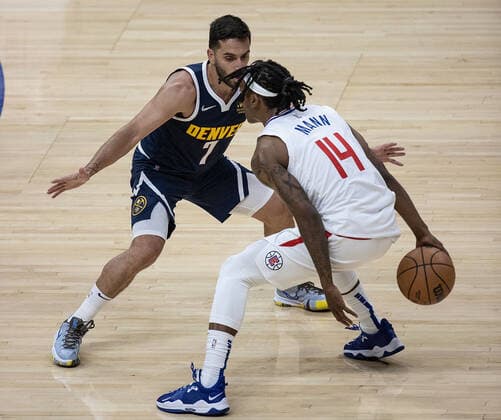 October 4, 2021, Los Angeles, California, USA: Michael Porter Jr. 1 of the Denver Nuggets defends against Terance Mann 14 of the Los Angeles Clippers during their preseason NBA, Basketball Herren, USA game on Monday October 4, 2021 at the Staples Center in Los Angeles, California. Clippers defeat Nuggets, 103 - 102. PI Los Angeles USA - ZUMAp124 20211004_zaa_p124_018 Copyright: xJAVIERxROJASx