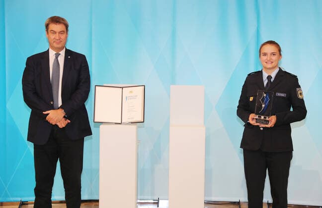 The Bavarian Prime Minister Dr Markus Söder awards the Bavarian Medalists of Tokyo the Bavarian Sports Award Markus Söder and Charline Schwarz Munich Bavaria Germany State Chancellery Kuppelsaal