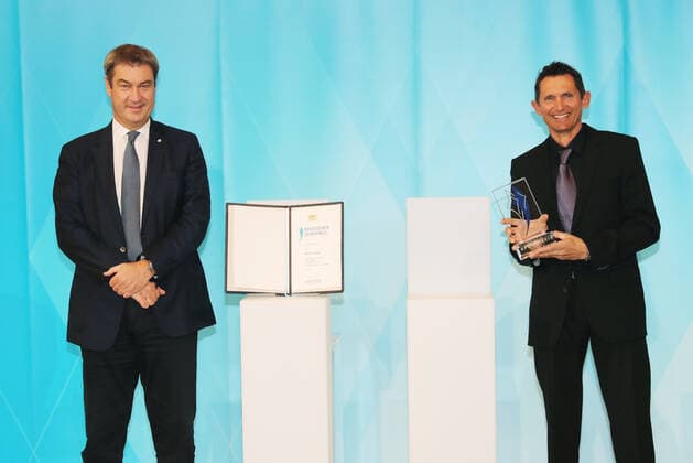 The Bavarian Prime Minister Dr Markus Söder awards the Bavarian Sports Award to the Bavarian medal winners from Tokyo Markus Söder and Michael Teuber Munich Bavaria Germany State Chancellery Kuppelsaal