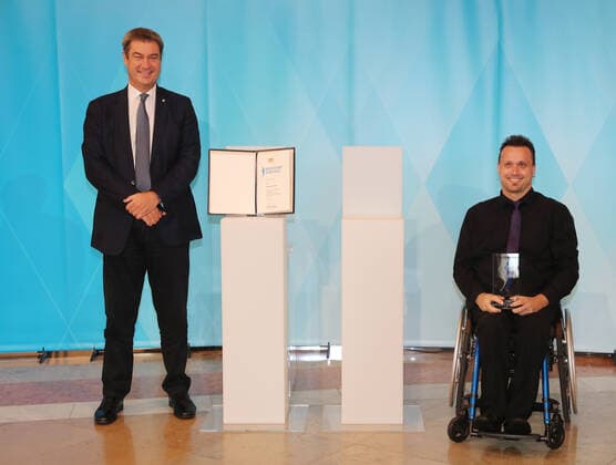 The Bavarian Prime Minister Dr Markus Söder awards the Bavarian Sports Award to the Bavarian medal winners from Tokyo Markus Söder and Thomas Brüchle Munich Bavaria Germany State Chancellery Kuppelsaal