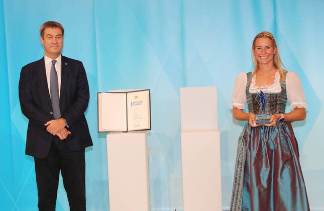 The Bavarian Prime Minister Dr Markus Söder awards the Bavarian Medalists of Tokyo the Bavarian Sports Award Markus Söder and Tina Lutz Munich Bavaria Germany State Chancellery Kuppelsaal