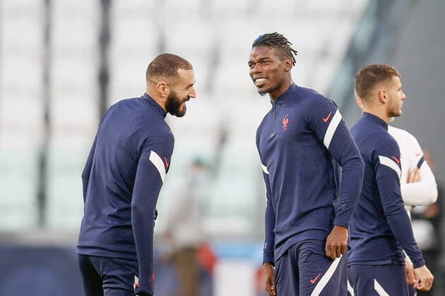 France s Karim Benzema and France s Paul Pogba pictured during a training session of the French national soccer team, in Torino, Italy, on Wednesday 06 October 2021. The team is preparing for the semi-finals of the Nations League, against Belgium on Thursday. BRUNOxFAHY  x3107823x