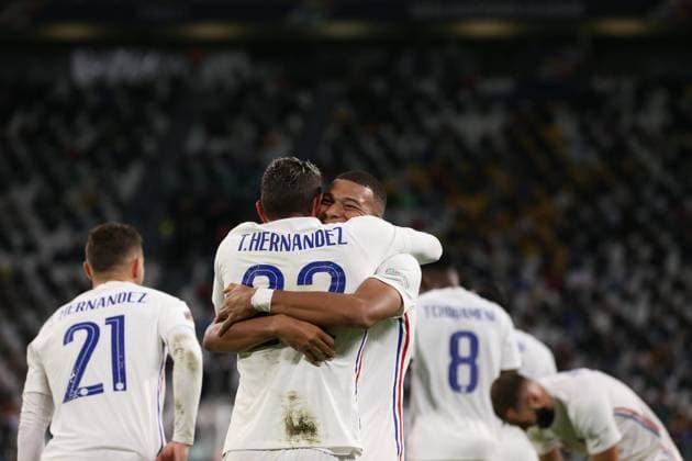 Turin, Italy, 7th October 2021. Theo Hernandez of France celebrates with team mates after scoring to give the side a 3-2 lead during the UEFA Nations League match at Juventus Stadium, Turin. Picture credit should read: Jonathan Moscrop Sportimage EDITORIAL USE ONLY. No use with unauthorised audio, video, data, fixture lists, club league logos or live services. Online in-match use limited to 120 images, no video emulation. No use in betting, games or single club league player publications. SPI-1228-0063